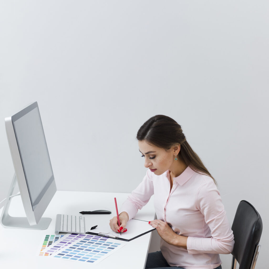 side view woman writing something down while desk Our Services