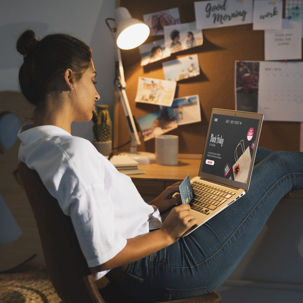 woman looking laptop home desk Social Media Marketing