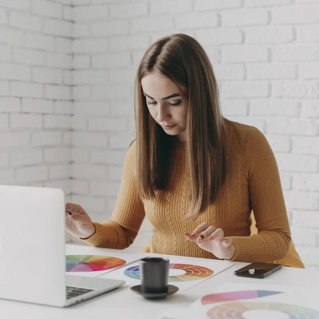woman looking color palettes medium shot branding